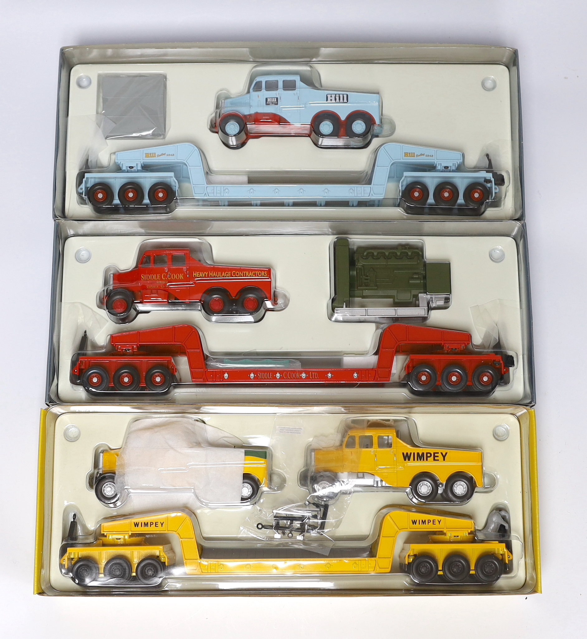 Three boxed Corgi Classics including two Heavy Haulage Scammell Constructors and low loaders (17601 and 17603) and a Building Britain Scammell two-vehicle set (17702)